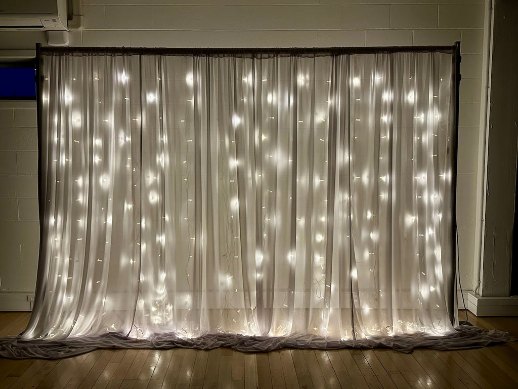 Ivory Backdrop Curtain Hire