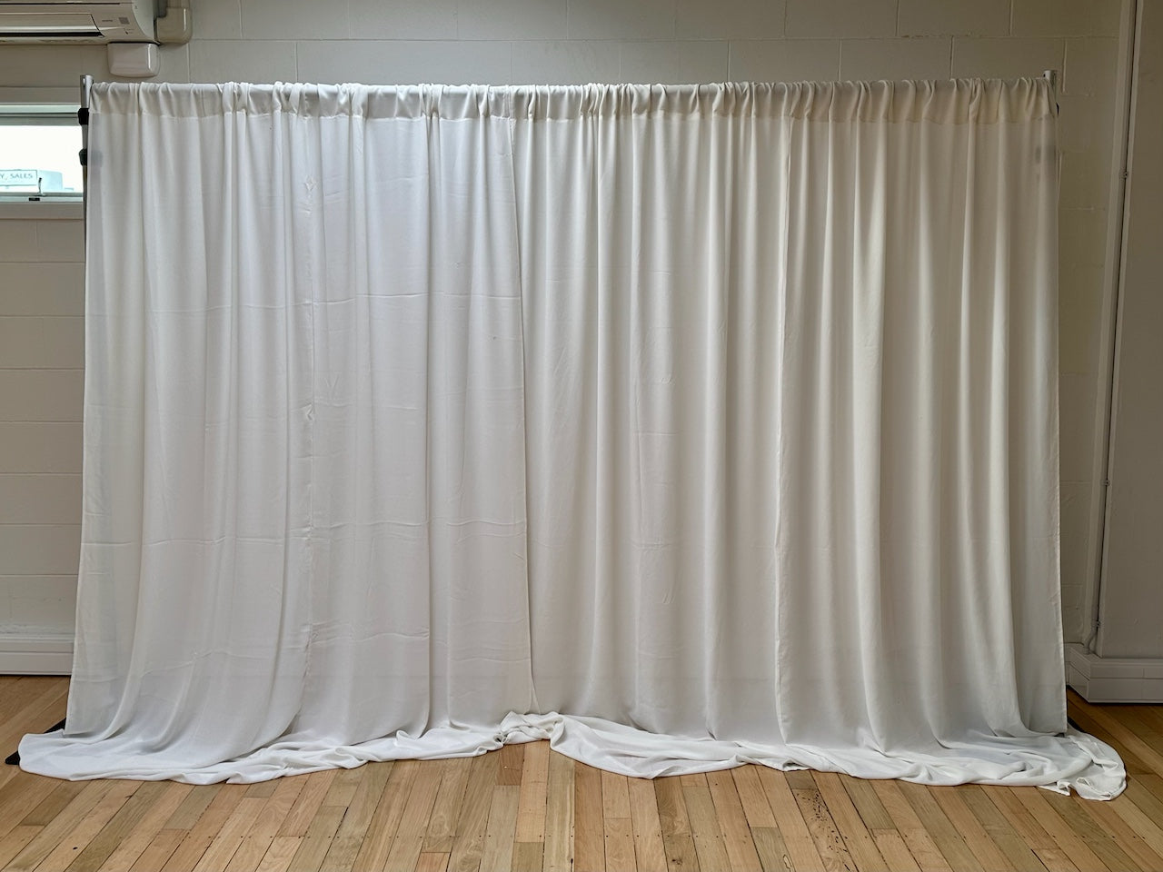 Ivory Backdrop Curtain Hire