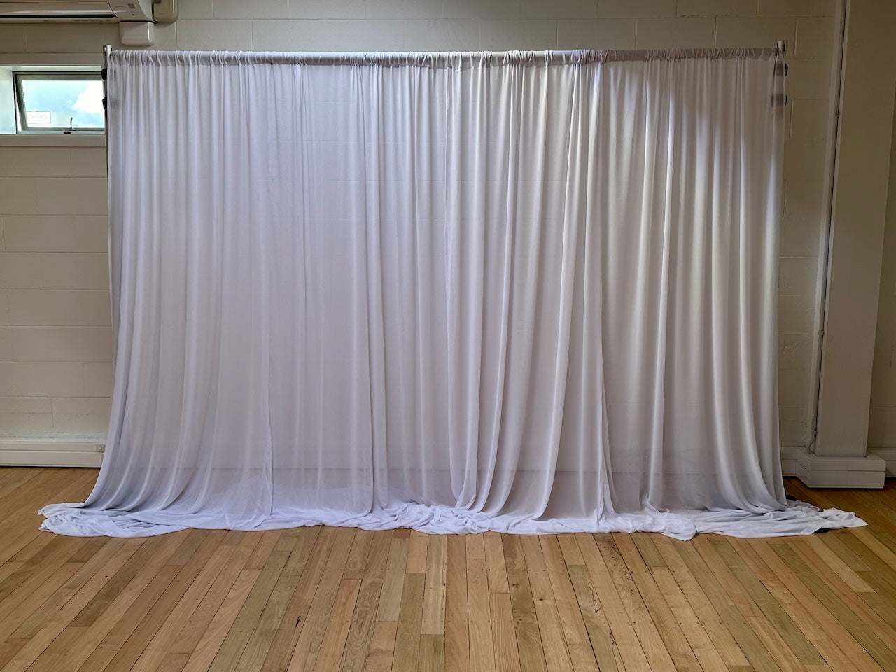 White Backdrop Curtain Hire